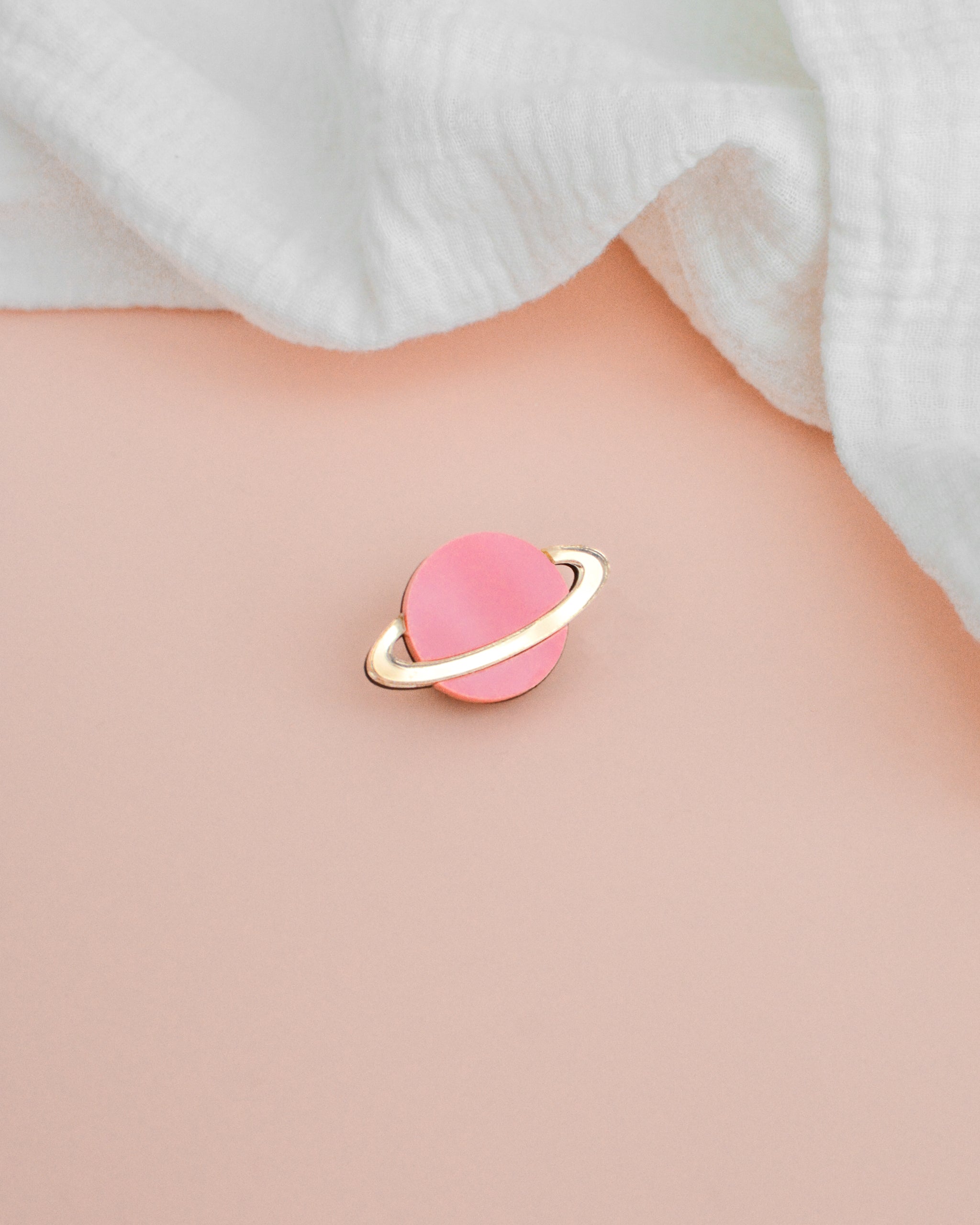 Pin's Planète rose