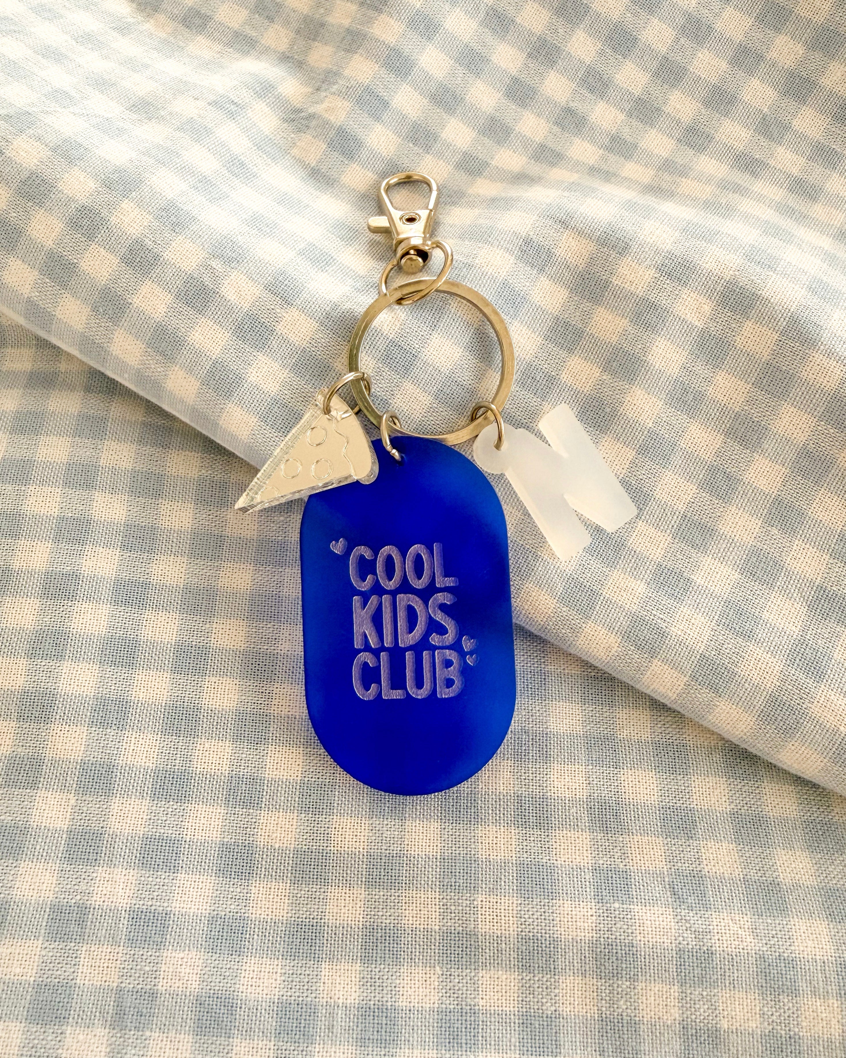 Porte-clés grigri Cool Kids Club