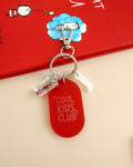 Porte-clés grigri Cool Kids Club