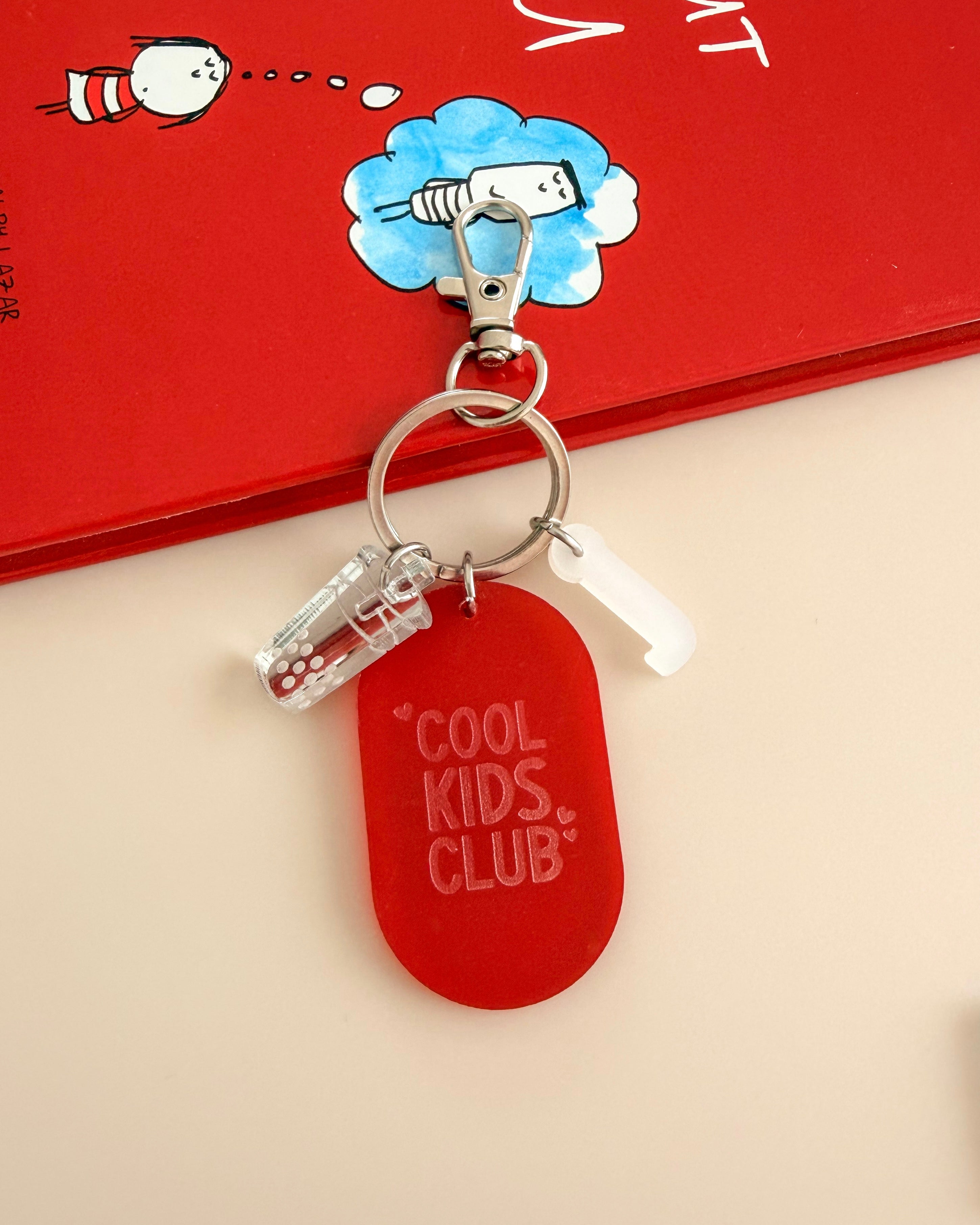 Porte-clés grigri Cool Kids Club