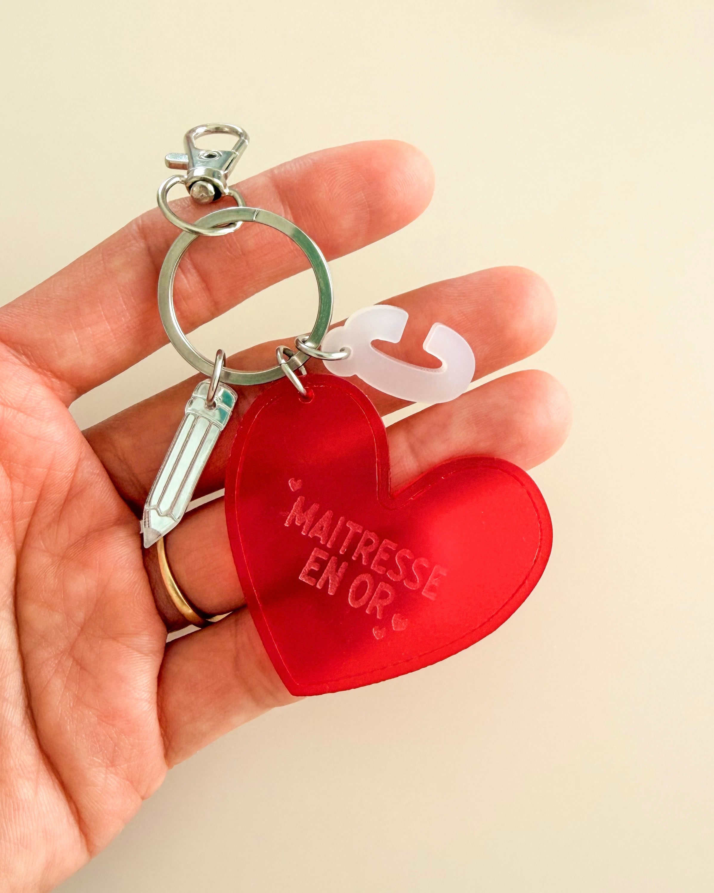Porte-clés grigri Maîtresse en or