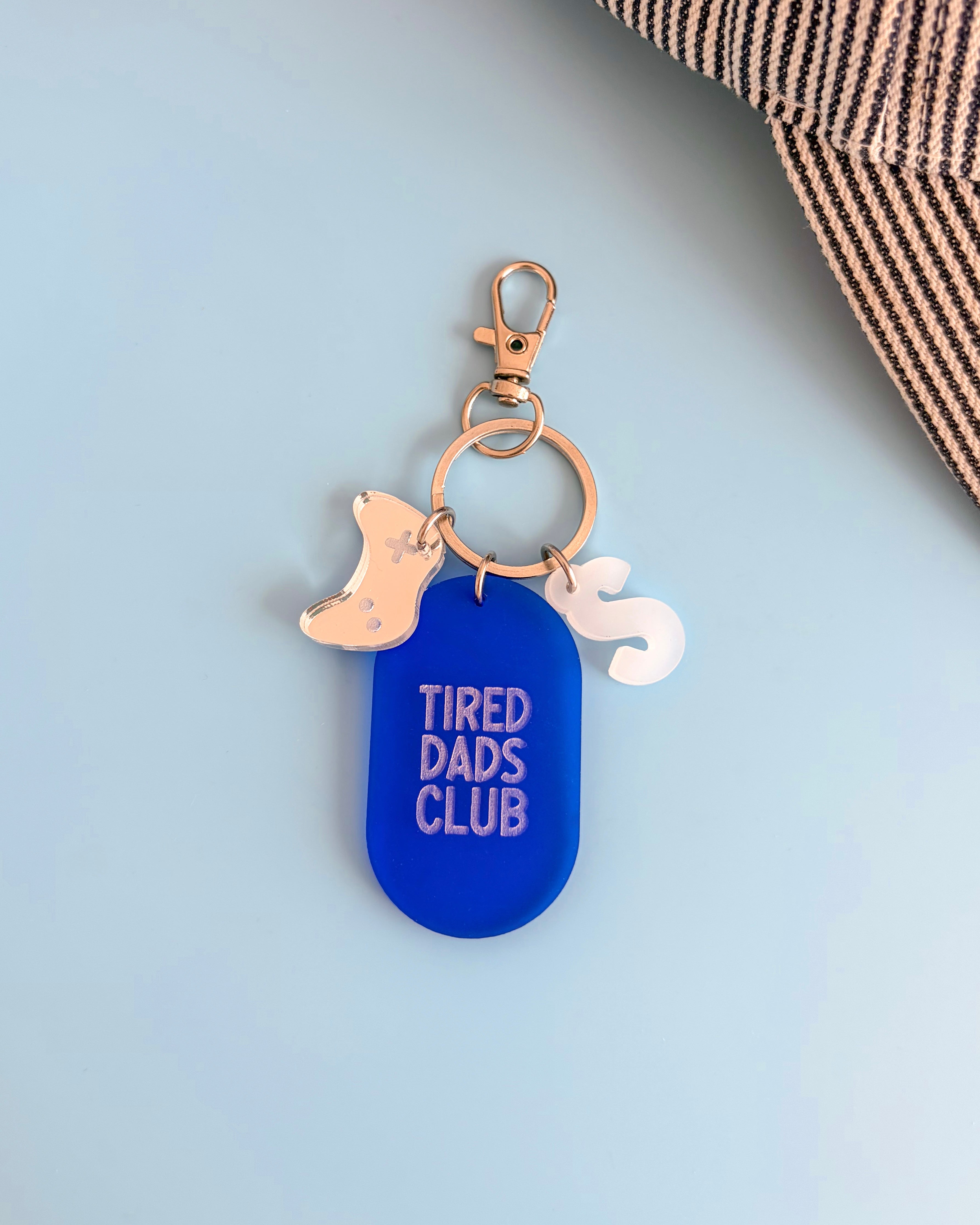 Porte-clés grigri Tired Dads Club